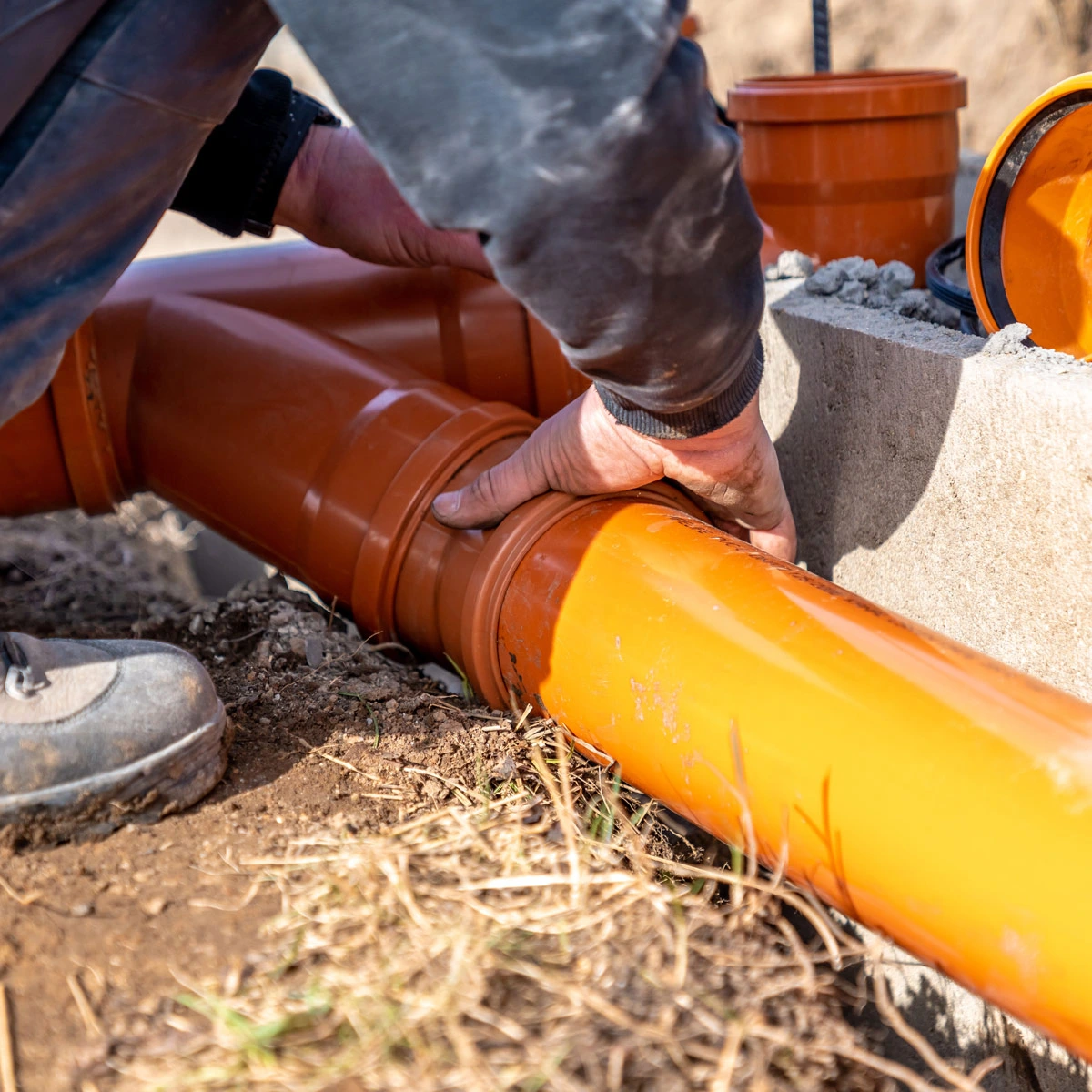 Plumber doing drain repair